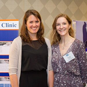 a couple of people smiling